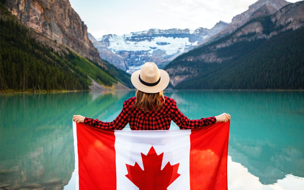 women holding Canada flag